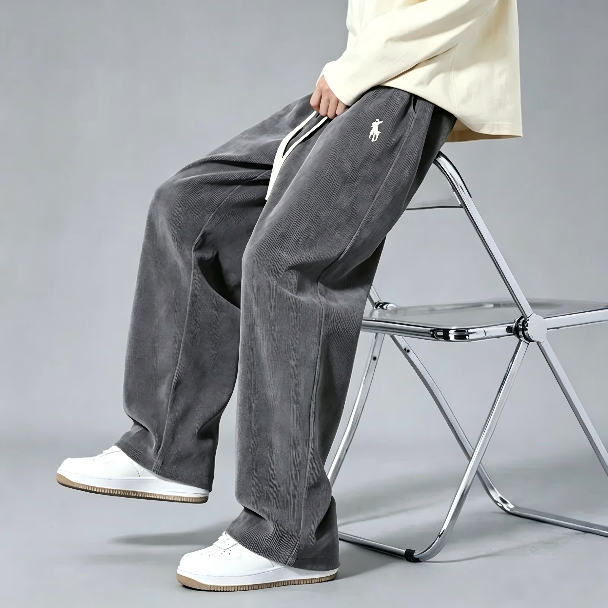 Men's corduroy wide-leg sweatpants—classic drawstring, loose-fit casual trousers.