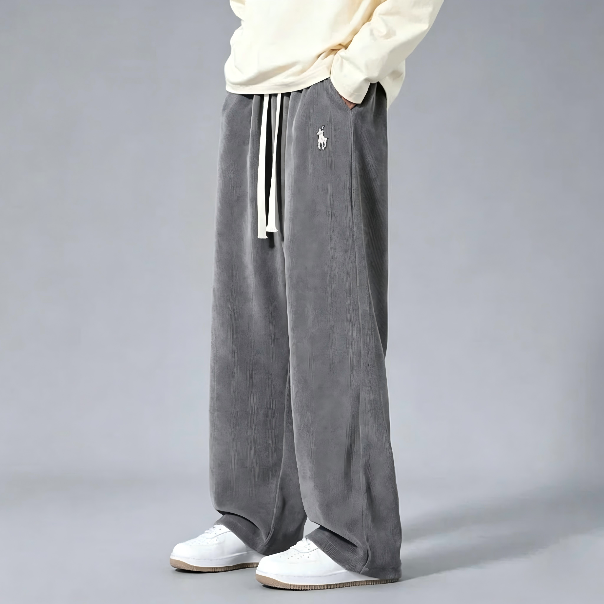 Men's corduroy wide-leg sweatpants—classic drawstring, loose-fit casual trousers.