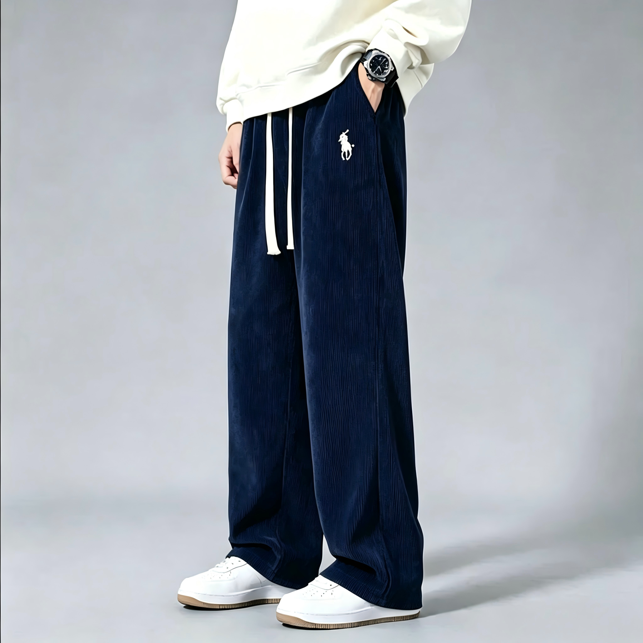 Men's corduroy wide-leg sweatpants—classic drawstring, loose-fit casual trousers.